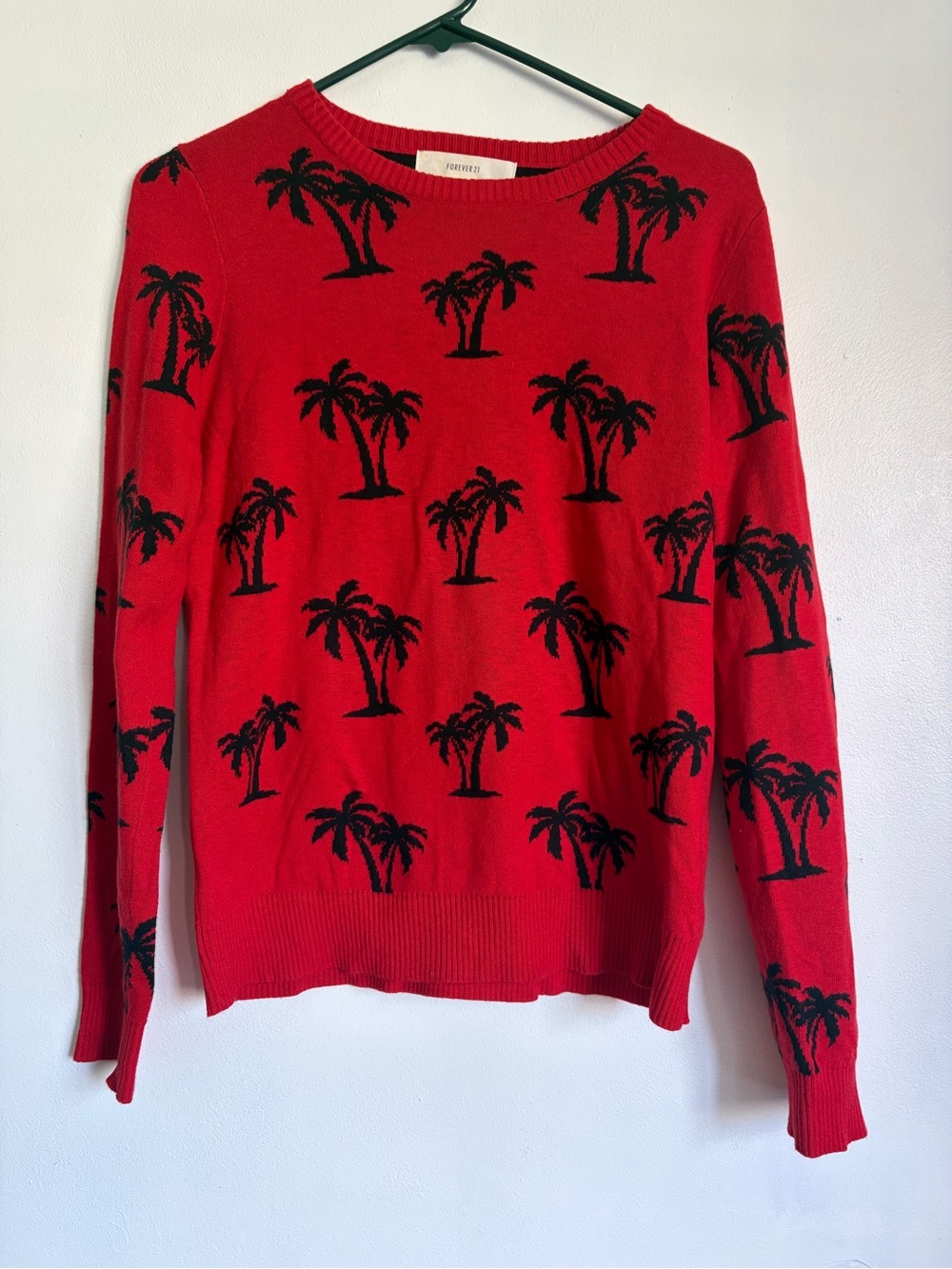 Red Knit Sweater with Black Palm Tree Motif palm tree in n out California